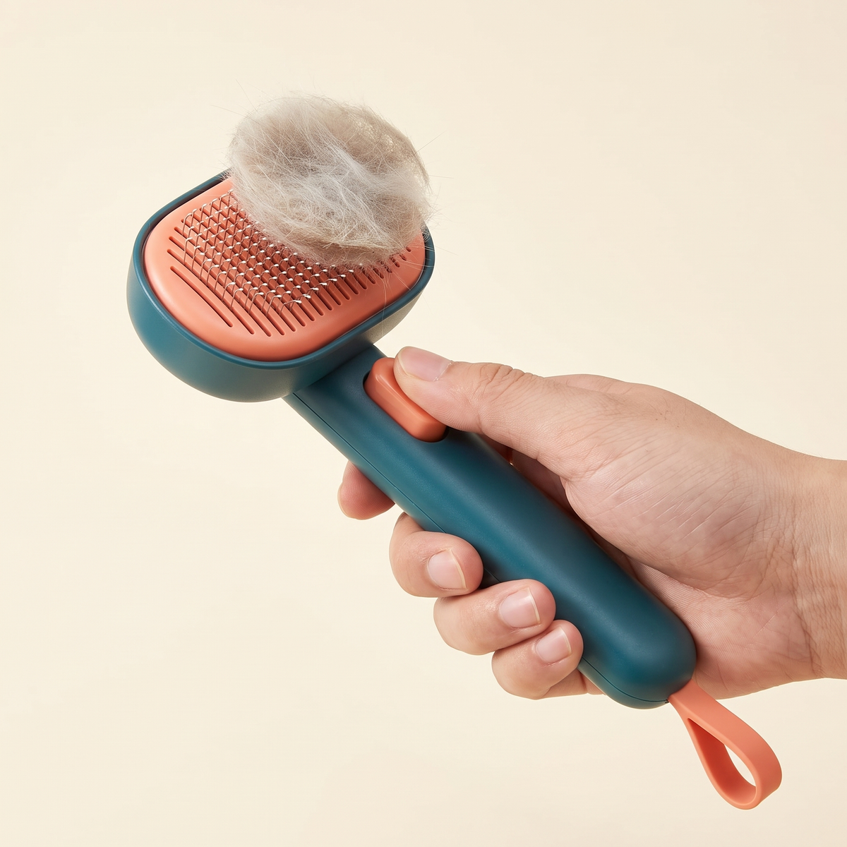 One-press self-cleaning: fur lifts off the brush